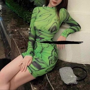 Green Meshed ruched dress